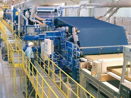 Dieffenbacher-type wood panel production line where anti-static dryer belts run