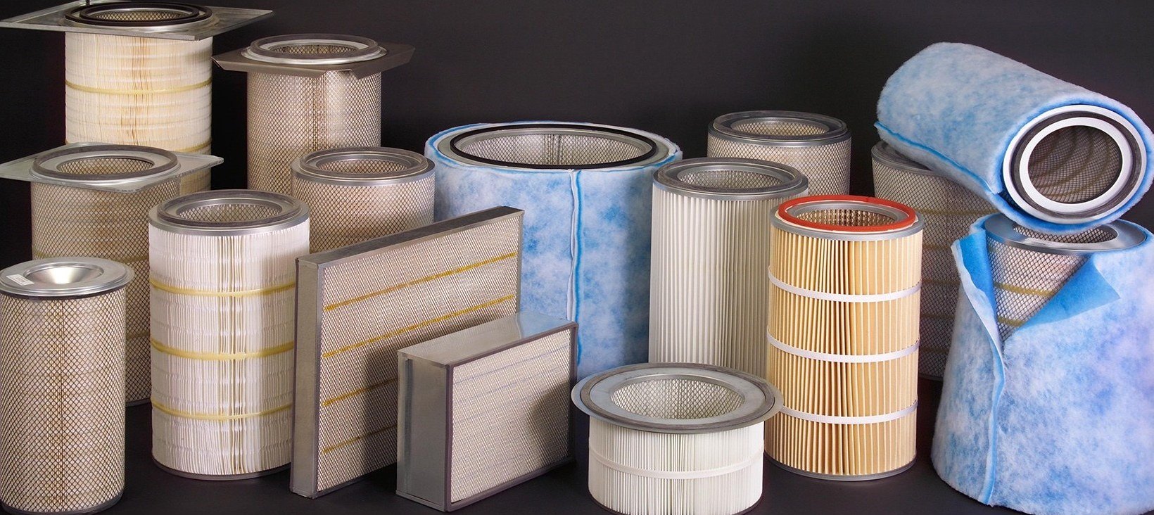 Filter cartridge range lined up, from cellulose to PTFE membrane series
