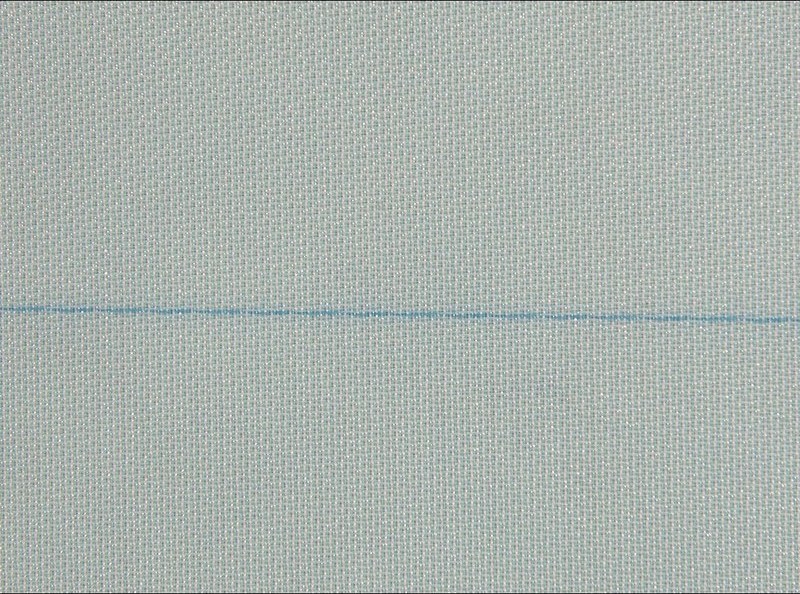 Forming wire close-up, the white polyester weave with blue stripes used on paper machine formers