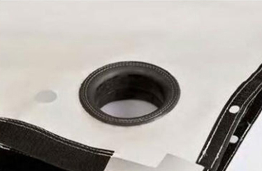 Rubber grommet fitted at a press filter cloth corner hole