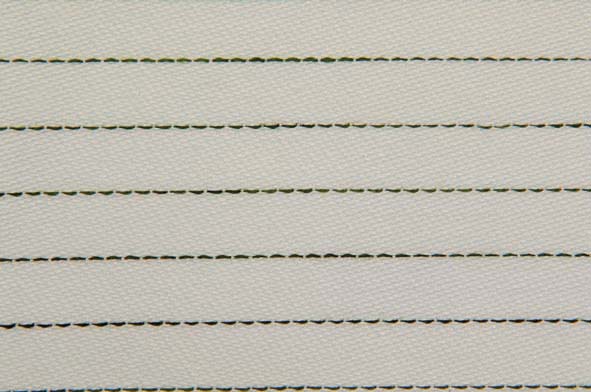 Anti-static press filter cloth with conductive filaments woven into the weft