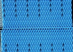 Double rim seam on an anti-static nonwoven dryer fabric
