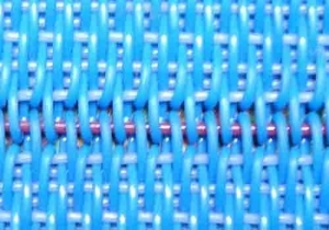 Single loop seam of a nonwoven filter fabric belt, close-up