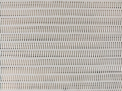 Spiral press belt with PET filler yarns inside the spiral loops